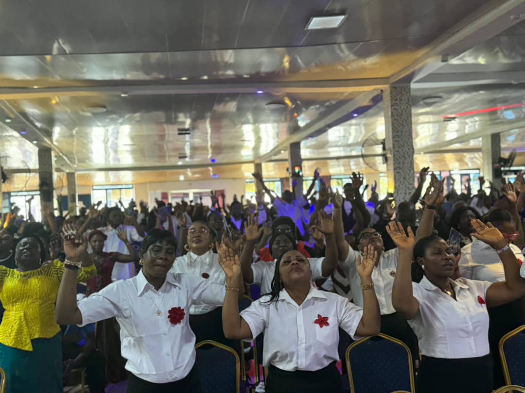 Church members worshipping together